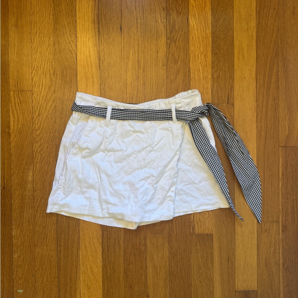 Aqua folded over white skort with plaid belt